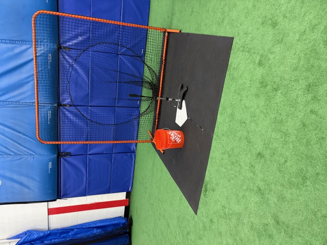 Tee station with net